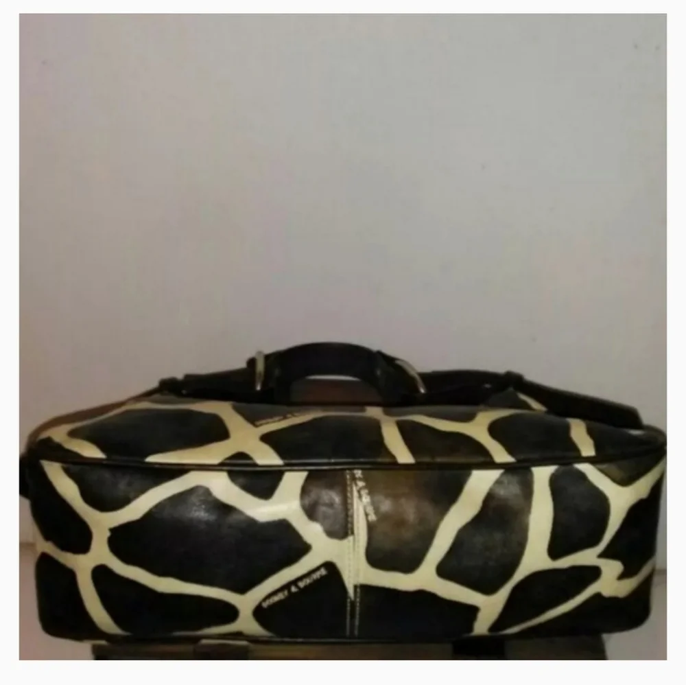 Dooney and Bourke leather giraffe pattern handbag